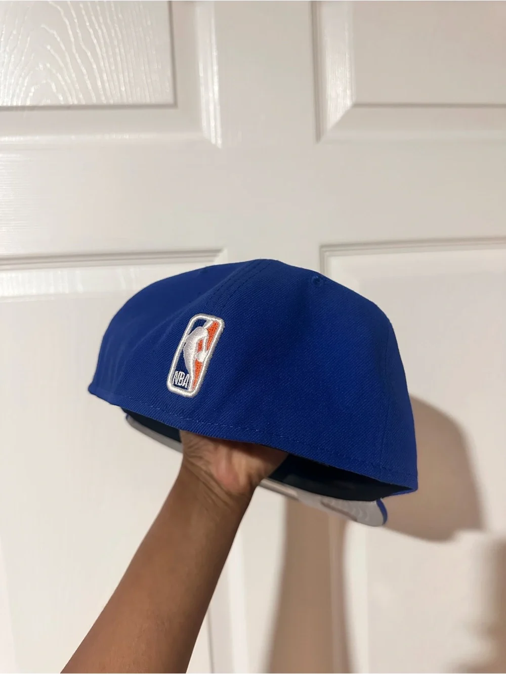 New Era Royal Blue New York Knicks Fitted Hat with Orange Logo